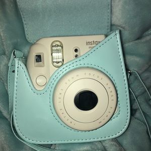 white polaroid w/ baby blue case!